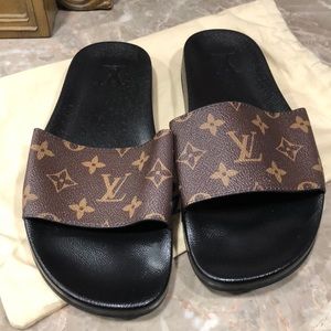 Louis Vuitton Woman’s brown size 8 LV slides